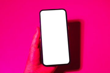 Mobile phone mockup in pink and purple light.Design template for concept design. Modern communication. Business app. Digital app mock up. Mock up template. Modern technology device screen.