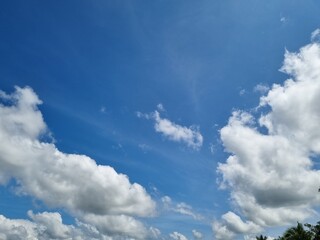 beautiful blue sky after the rain  soft white clouds