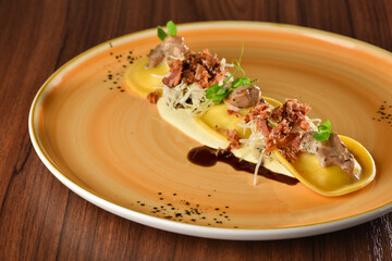 Fine dining Ravioli with mushrooms