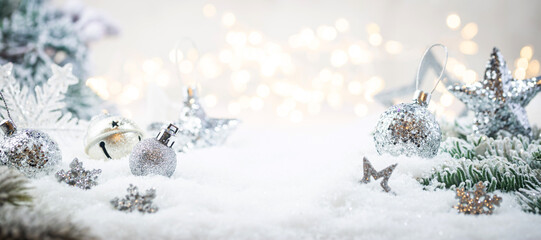 Fototapeta na wymiar Christmas decorations on snow