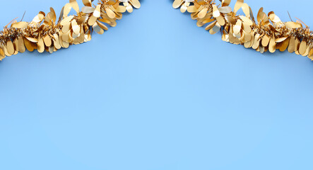 gold chain garland over blue background. Traditional jewish sukkot holiday decoration