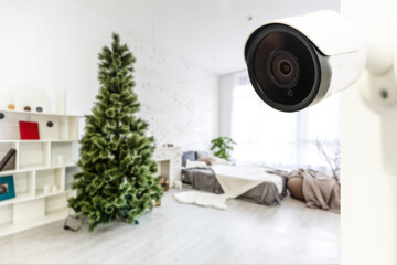 Close Up Object Shot of a Modern Wi-Fi Surveillance Camera on a White Wall in a Cozy Apartment