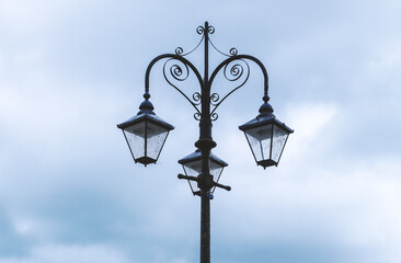 Old street lamp against the sky