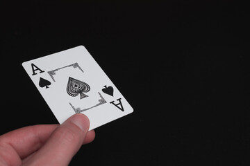 Playing cards aces on black