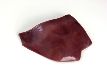 Raw liver on a white background