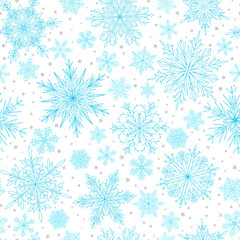 Seamless pattern with complex big and small Christmas snowflakes in light blue colors. Winter background with falling snow