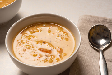 Homemade yellow split pea lentil soup served in a bowl. Arhar dal.