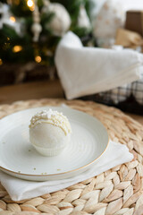 Chocolate bomb for a milk drink on a plate