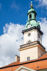 Fototapeta na wymiar Town tower with clock and bell
