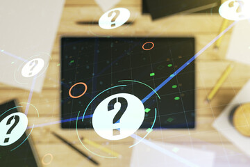 Double exposure of question mark hologram and digital tablet on background, top view. Sociology and...