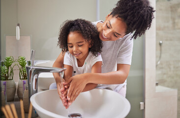 Family, washing hands and child with mom rinsing, cleaning and good hygiene against bacteria or germs for infection or virus protection in bathroom. Girl kid with woman for health and cleanliness - Powered by Adobe