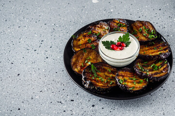 grilled eggplant on Georgian on a gray stone background