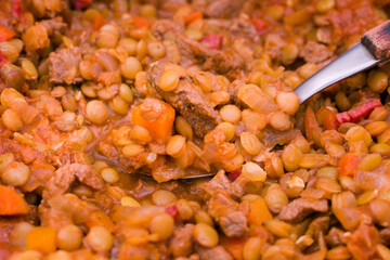 Spanish Lentils and chorizo stew prepared in the traditional way.