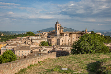 Aerial panorama of the Ducal Palace of Urbino medieval walled town and university in Marche, Italy a popular travel destination