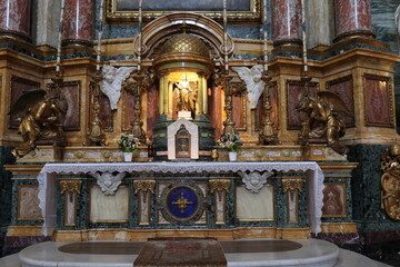 Ornate Altar at the Santi Ambrogio e Carlo al Corso Basilica in Rome, Italy