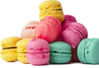 Pile of colorful macaroons isolated on white background, close up