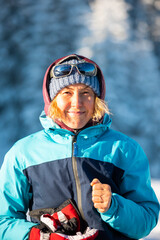 woman with a backpack in a winter hike