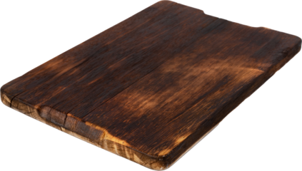 Dark wooden cutting board on white background, close up