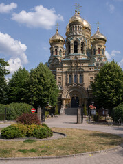 Obraz premium Liepaja, Latvia - August 19, 2022: Beautiful scenery of Liepaja town and surroundings in Latvia during a summer sunny day. St Nicholas Naval Cathedral, Karosta. Selective focus.