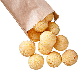 Delicious Brazilian cheese bread coming out of a paper bag. Also known in Latin America as Chipa, Pan de Bono and Pan de Yuca.