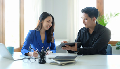 Business people in the office are planning a strategy for the future of the business.