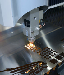 CNC plasma cutting machine working cut metal sheet