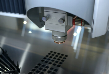 CNC plasma cutting machine working cut metal sheet