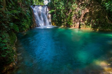 Fototapeta na wymiar Beautiful blue waterfall quite and calming