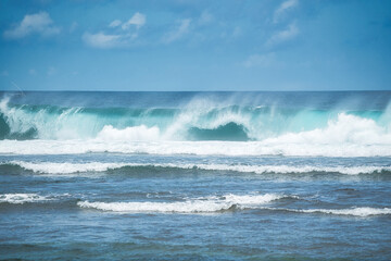 wave breaking crashing on the beach - Bali