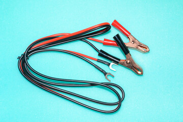 Starting wires for car battery. Equipment and accessories for cars. Car clip for battery terminals