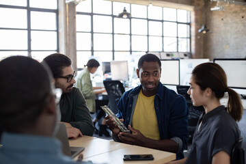 Team of engineers developing technology for robotics