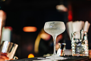 empty glass on a bar counter in bar or pub
