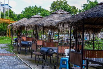 Dining table and chairs for outdoor riverside banquets
