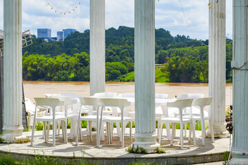 Dining table and chairs for outdoor riverside banquets