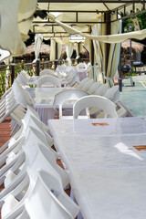 Dining table and chairs for outdoor riverside banquets