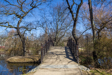 Wooden bridge in the Johannapark in historic city Leipzig, Germany