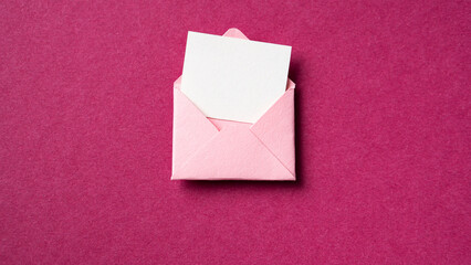 Blank white card with pink paper envelope template mockup