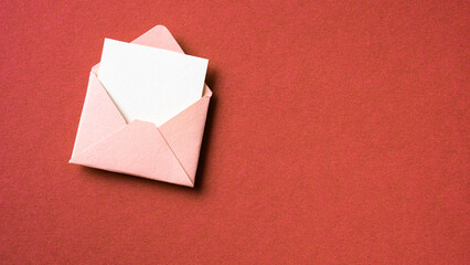 Blank white card with pink paper envelope template mockup