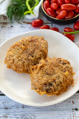 Turkish style meatballs. Turkish cuisine delicacies. Meatballs fried in breadcrumbs. local name Kadin Budu Kofte or Women's Leg Meatballs. Close-up