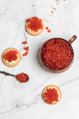 Salmon Red Caviar. Delicious snacks cracker, butter, salmon red caviar. Raw seafood. Luxury delicacy food. appetizer, selective focus, place for text