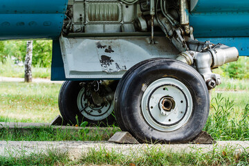 The landing gear of a military aircraft of the times of the USSR. Close-up