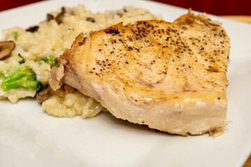 Fresh, Homemade Pan Seared Swordfish swerved with a Mushroom and Broccoli Risotto