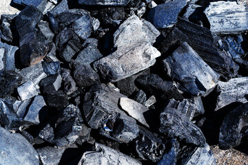 Charcoal. Fuel for cooking and space heating. flat lay frame