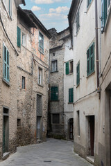 Fototapeta na wymiar Alley in the medieval village of Pontremoli in Tuscany, Italy