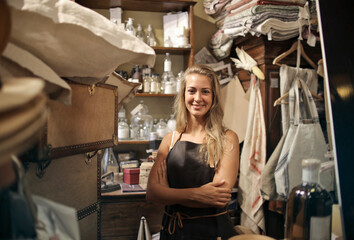 young woman works in a local craft shop