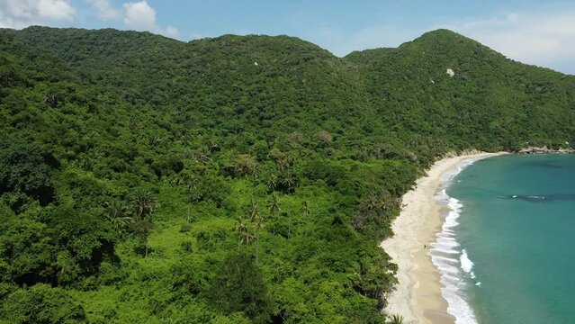 Santa Marta Colombia , Tayrona Natural Park Caribbean sea Cabo San Juan  - Drone aerial view of amazing  sand beach and  forest - Tourist attraction for relax and enjoy the paradise of the ocean sea 