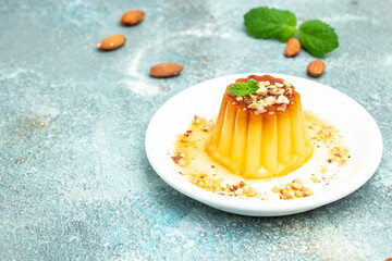 panna cota with caramel. Creme Caramel Dessert on a light background. banner, menu, recipe place for text, top view