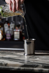 Pouring a cocktail