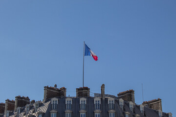 French flag on the top of a building