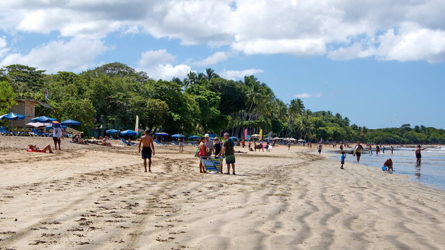 Tourists on the beach in Tamarindo, Costa Rica
